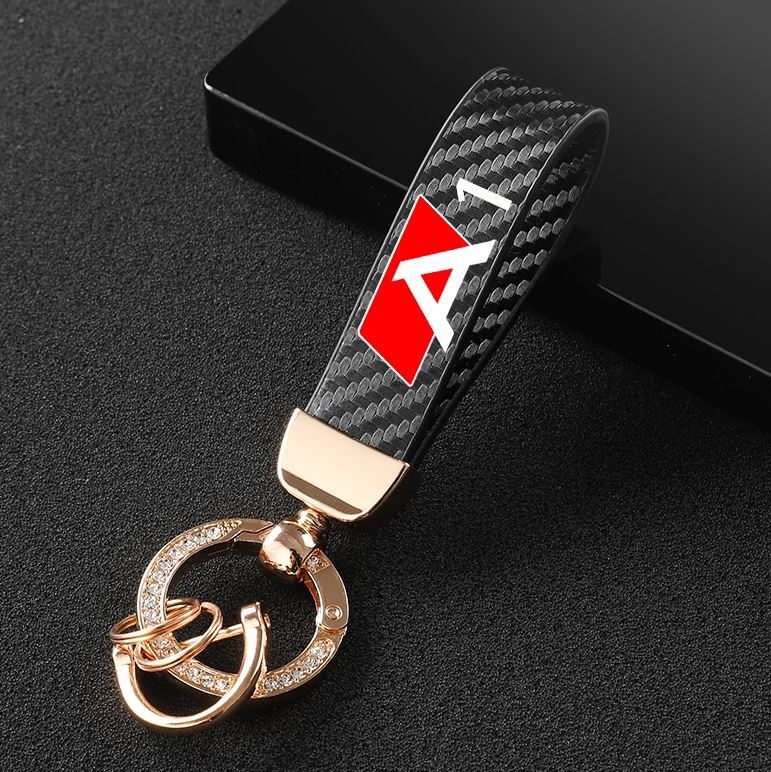 Car keychain/key ring, black and gold horseshoe buckle accessory for Audi A1