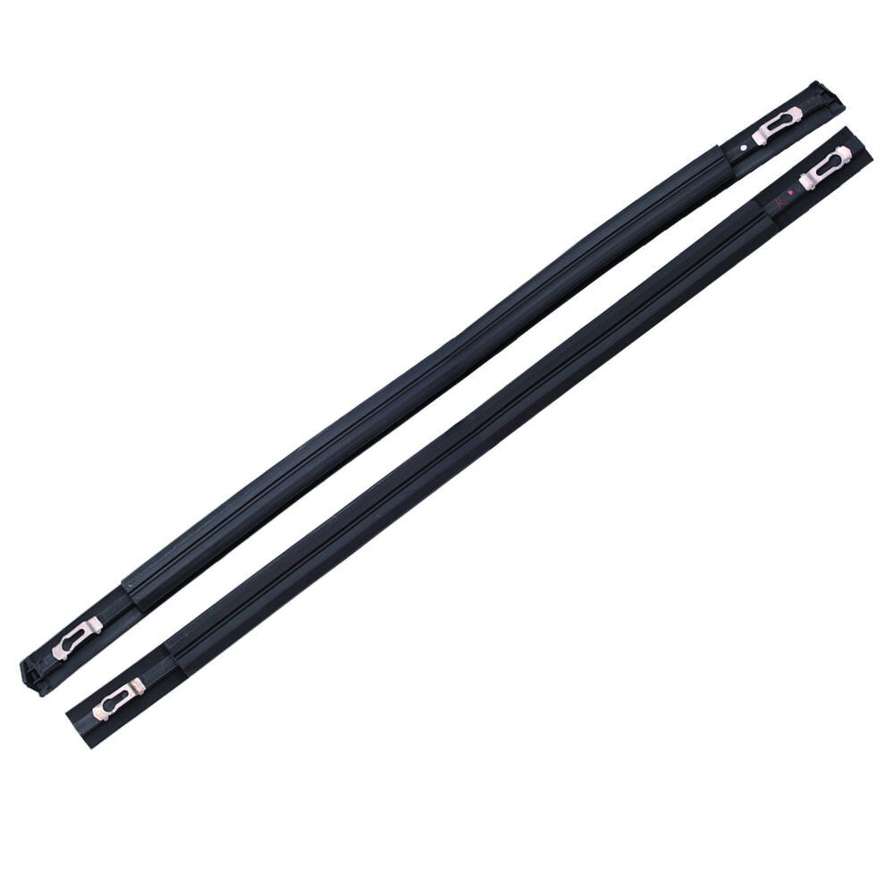 A pair of new black roof trim molding kits for 2009-2014 for Honda Fit 5-door models.