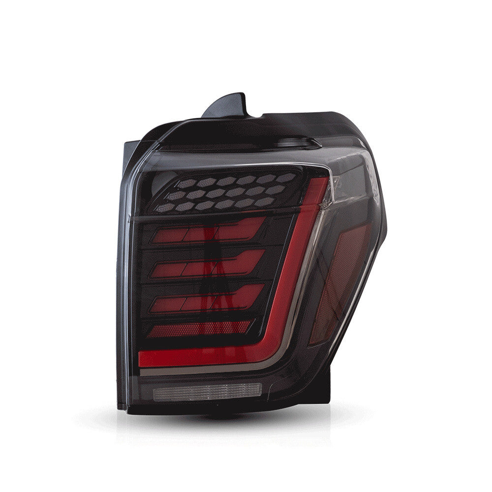 A pair of taillights for the 2014-21 for Toyota 4Runner, featuring transparent LED brake light assemblies.